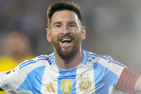 Argentina's Lionel Messi celebrates after scoring his side's opening goal against Bolivia during a World Cup 2026 qualifying soccer match at Monumental stadium in Buenos Aires, Argentina, Tuesday, Oct. 15, 2024. (AP Photo/Natacha Pisarenko)