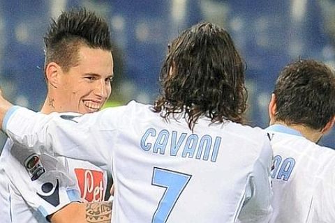 Midfielder of Napoli, Marek Hamsik (L), jubilates with his teammates after scoring the goal against Genoa during their Italian Serie A soccer match at Luigi Ferraris stadium in Genoa, Italy on 11 December 2010.
ANSA/LUCA ZENNARO