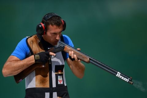 LONDON, ENGLAND - AUGUST 06:  Giovanni Cernogoraz of Croatia competes during the Men's Trap Shooting qualifying on Day 10 of the London 2012 Olympic Game at the Royal Artillery Barracks on August 6, 2012 in London, England.  (Photo by Lars Baron/Getty Images)