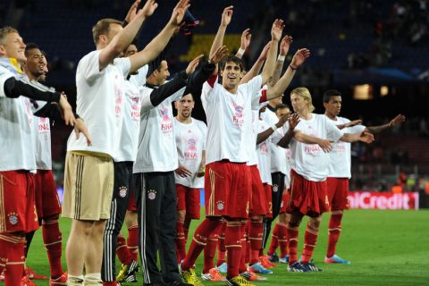 Bayern Munich's players celebrate their victory after the UEFA Champions League semi-final second leg football match FC Barcelona vs FC Bayern Munich at the Camp Nou stadium in Barcelona on May 1, 2013. Bayern Munich won the match 3-0.  AFP PHOTO / LLUIS GENE        (Photo credit should read LLUIS GENE/AFP/Getty Images)