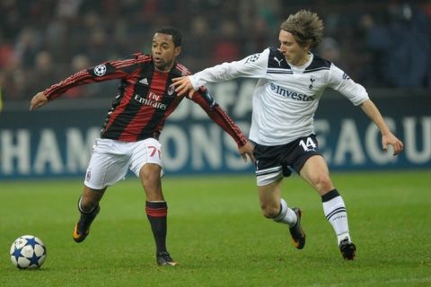 Tottenham's Croatian midfielder Luka Modric (R) fights for the ball with AC Milan's Brazilian forward Robinho during their Champions League football match on February 15, 2011 at San Siro Stadium in Milan. Tottenham defeated AC Milan 1-0.  AFP PHOTO / GIUSEPPE CACACE (Photo credit should read GIUSEPPE CACACE/AFP/Getty Images)