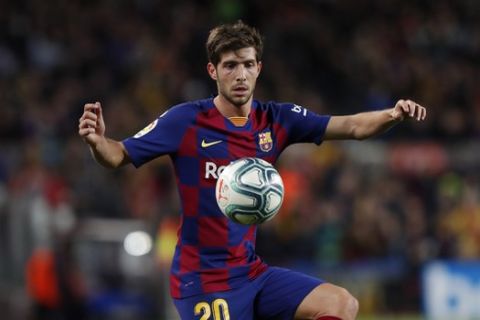 Barcelona's Sergi Roberto during a Spanish La Liga soccer match between Barcelona and Celta at the Camp Nou stadium in Barcelona, Spain, Nov. 9, 2019. (AP Photo/Joan Monfort)