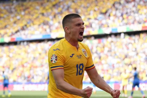 Romania's Razvan Marin celebrates during a Group E match between Romania and Ukraine at the Euro 2024 soccer tournament in Munich, Germany, Monday, June 17, 2024. Romania won 3-0. (AP Photo/Antonio Calanni)