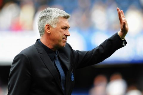 LONDON, ENGLAND - MAY 15:  Carlo Ancelotti the Chelsea manager acknowledges the home fans following the Barclays Premier League match between Chelsea and Newcastle United at Stamford Bridge on May 15, 2011 in London, England.  (Photo by Michael Regan/Getty Images)