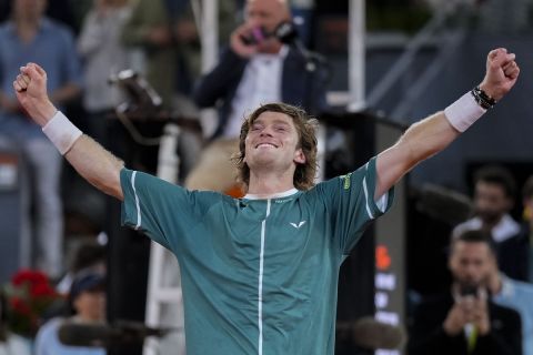 Andrey Rublev, of Russia, celebrates after winning the final match against Felix Auger-Aliassime, of Canada, at the Madrid Open tennis tournament in Madrid, Spain, Sunday, May 5, 2024. (AP Photo/Manu Fernandez)