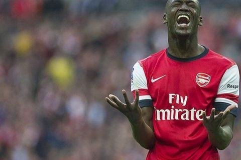 Arsenal's Yaya Sanogo, reacts, during their English FA Cup semifinal soccer match against  Wigan Athletic, at the Wembley Stadium in London, Saturday, April 12, 2014. (AP Photo/Bogdan Maran)