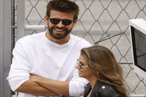 Former Barcelona football star Gerard Pique and his girlfriend Clara Chia Marti stand at pit prior to the start of the MotoGP race of the Catalunya Motorcycle Grand Prix at the Catalunya racetrack in Montmelo, just outside of Barcelona, Spain, Sunday, Sept. 3, 2023. (AP Photo/Joan Monfort)