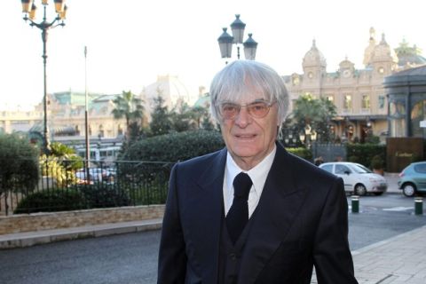 Formula One boss and F1 rights holder Bernie Ecclestone arrives for the world congress of the FIA (Fration Internationale de l'Automobile), on December 10, 2010 in Monaco.   AFP PHOTO VALERY HACHE (Photo credit should read VALERY HACHE/AFP/Getty Images)