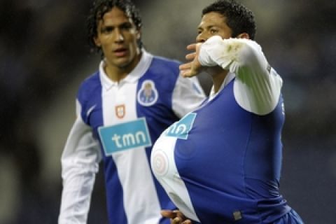 FC Porto´s forward Givanildo de Souza "Hulk" from Brazil (R) celebrates after scoring against Rio Ave during their Portuguese league football match at the Dragao Stadium in Porto, on November 29, 2009. AFP PHOTO/MIGUEL RIOPA (Photo credit should read MIGUEL RIOPA/AFP/Getty Images)