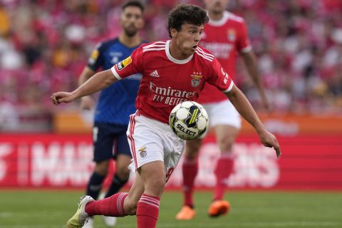 Benfica's Joao Neves controls the ball during the Portuguese League last round soccer match between Benfica and Santa Clara at the Luz stadium in Lisbon, Saturday, May 27, 2023. (AP Photo/Armando Franca)