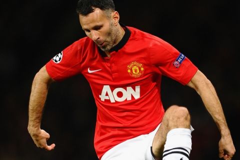 MANCHESTER, ENGLAND - MARCH 19:  Ryan Giggs of Manchester United in action during the UEFA Champions League Round of 16 second round match between Manchester United and Olympiacos FC at Old Trafford on March 19, 2014 in Manchester, England.  (Photo by Laurence Griffiths/Getty Images)