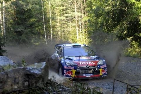 French Citroen pilot Sebastien Ogier speeds during the shakedown of the FIA World Rally Championship WRC Neste Oil Rally Finland near Jyvaskyla on Thursday July 28, 2011. (AP Photo / LEHTIKUVA, Martti Kainulainen)  FINLAND OUT - NO SALES