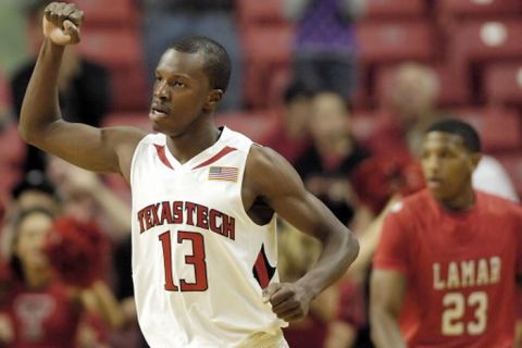 Texas Tech's David Tairu celebrates as he runs down the court during ht first half against Lamar Saturday Nov. 21, 2009 at United Spirit Arena. (John A. Bowersmith/Lubbock Avalanche-Journal)