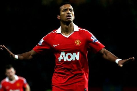 MANCHESTER, ENGLAND - JANUARY 04:  Nani of Manchester United celebrates scoring his team's second goal during the Barclays Premier League match between Manchester United and Stoke City at Old Trafford on January 4, 2011 in Manchester, England.  (Photo by Clive Brunskill/Getty Images)