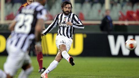 FLORENCE, ITALY - MARCH 20: Andrea Pirlo of Juventus FC scores the opening goal during the UEFA Europa League Round of 16 second leg match between ACF Fiorentina and Juventus at Stadio Artemio Franchi on March 20, 2014 in Florence, Italy.  (Photo by Gabriele Maltinti/Getty Images)