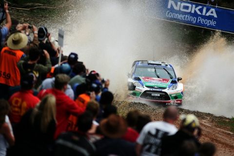 COFFS HARBOUR, AUSTRALIA - SEPTEMBER 09:  Mikko Hirvonen of Finland and Jarmo Lehtinen of Finland compete in their Ford Abu Dhabi WRT Ford Fiesta RS WRC during Day1 of the WRC Rally Australia on September 9, 2011 in Coffs Harbour, Australia.  (Photo by Massimo Bettiol/Getty Images)