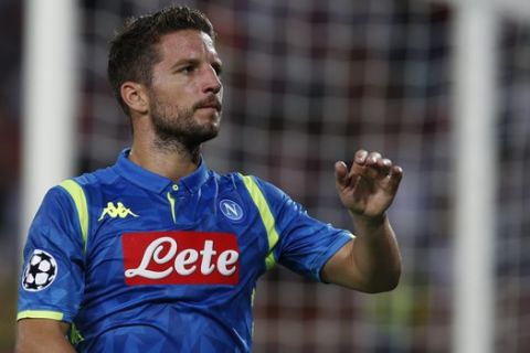 Napoli forward Dries Mertens salutes supporters after the Champions League group C soccer match between Red Star and Napoli, in Belgrade, Serbia, Tuesday, Sept. 18, 2018. (AP Photo/Darko Vojinovic)