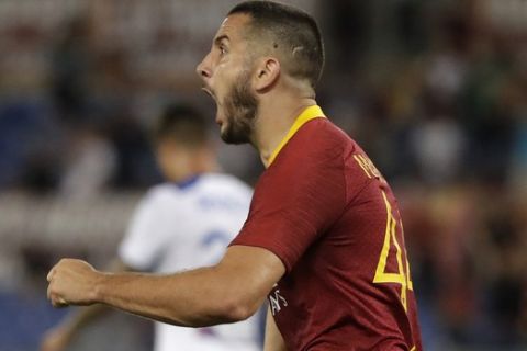 Roma's Kostas Manolas celebrates after scoring during a Serie A soccer match between Roma and Atalanta, in Rome's Olympic stadium, Monday, Aug. 27, 2018. (AP Photo/Andrew Medichini)