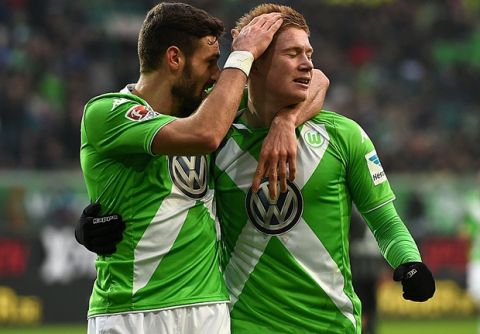 WOLFSBURG, GERMANY - MARCH 15:  Kevin De Bruyne of VfL Wolfsburg celebrates as he scores the opening goal during the Bundesliga match between VfL Wolfsburg and SC Freiburg at Volkswagen Arena on March 15, 2015 in Wolfsburg, Germany.  (Photo by Dennis Grombkowski/Bongarts/Getty Images)