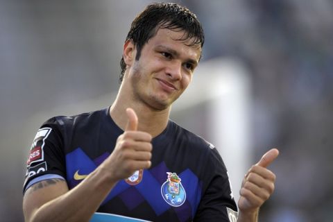 FC Porto's Brazilian forward Kleber Pinheiro gives the thumbs up during the Portuguese super league football match Rio Ave vs FC Porto at the Arcos Stadium in Vila do Conde, on May 12, 2012. Porto won the match 5-2 and Kleber scored three goals.   AFP PHOTO/ MIGUEL RIOPAMIGUEL RIOPA/AFP/GettyImages