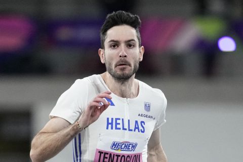 Miltiadis Tentoglou, of Greece, makes an attempt in the men's long jump during the World Athletics Indoor Championships at the Emirates Arena in Glasgow, Scotland, Saturday, March 2, 2024. (AP Photo/Bernat Armangue)