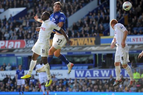 LIVERPOOL, ENGLAND - SEPTEMBER 17:   Apostolos Vellios of Everton scores his team's second goal  during the Barclays Premier League match between Everton and Wigan Athletic at Goodison Park on September 17, 2011 in Liverpool, England. (Photo by Chris Brunskill/Getty Images)